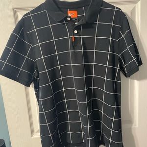 Nike Golf shirt. Black and white checkered. Size Large Smoke free.